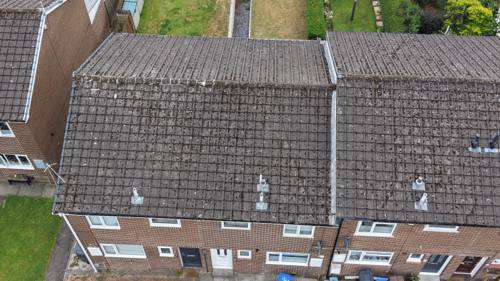 Angled drone shot of a terrace roof from above